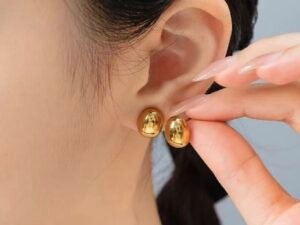 Aretes media esfera ovalo pequeño acero inoxidable chapado en oro de 18k