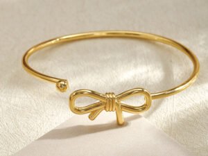 Aro moña acero inoxidable chapado en oro de 18k