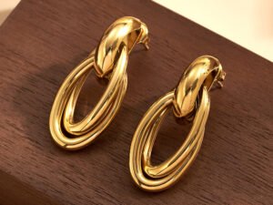 Aretes eslabon ovalado entrelazado acero inoxidable chapado en oro de 18k