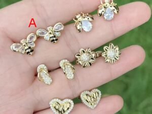 Aretes abejitas alas cristal chapado en oro de 18k