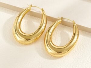 Argollas diseño U acero inoxidable chapado en oro