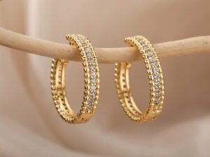 Argollas con circonias labradas acero inoxidable chapado en oro