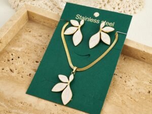 Set media flor ivory acero inoxidable chapado en oro