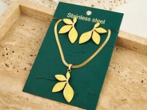 Set media flor amarilla acero inoxidable chapado en oro