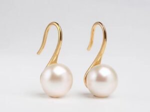 Aretes de perla colgante acero inoxidable chapado en oro