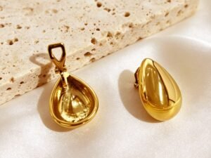 Aretes de presion gota grande acero inoxidable chapado en oro