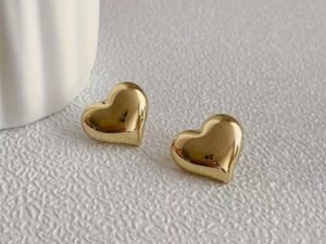 Aretes corazón liso acero inoxidable chapado en oro