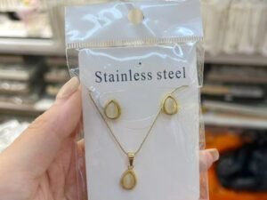 Set ovalado gota ámbar acero inoxidable chapado en oro