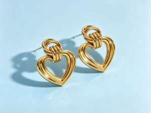 Aretes corazón entrelazado acero inoxidable chapado en oro