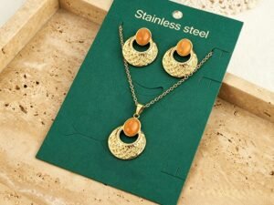 Set circular naranja acero inoxidable chapado en oro